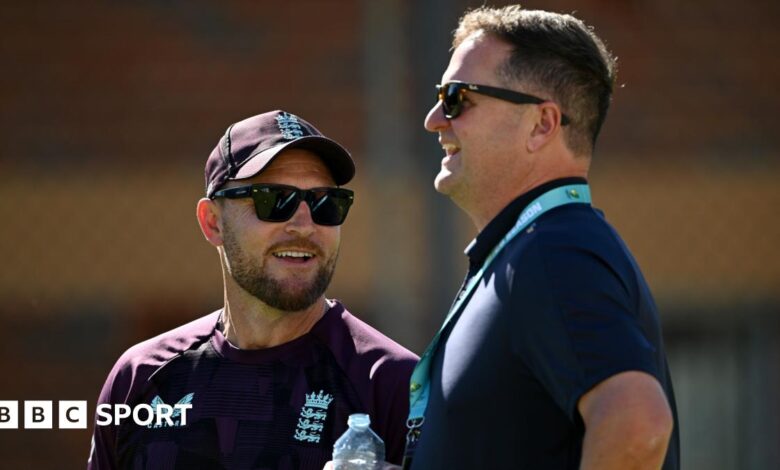 Brendon McCullum and Rob Key smile and look on